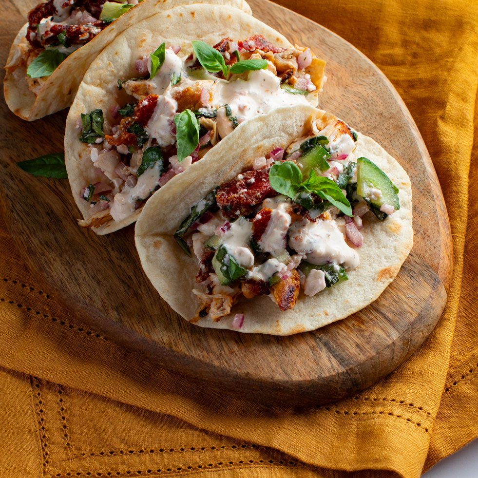 Mediterranean Chicken Tacos with Sun Dried Tomato Crema