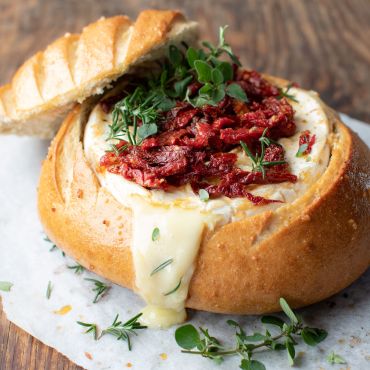 Sun Dried Tomato Baked Brie Sourdough Bowl