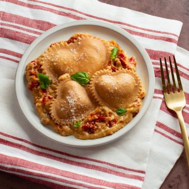 Valentine’s Ravioli with Sun Dried Tomato Alfredo