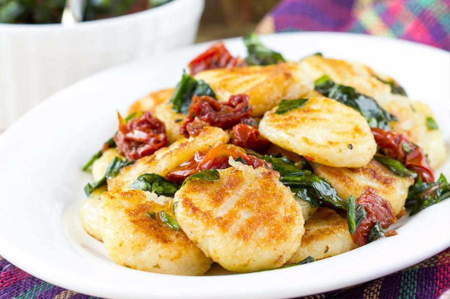 Mini Risotto Cakes with Sun Dried Tomatoes and Garlic Spinach Bella
